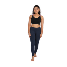 Load image into Gallery viewer, Deevaz Medium Impact Padded Non-Wired Sports Bra In Black Color With Lavender Cross Back Strap Detailing.