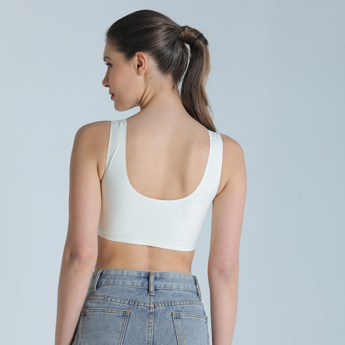 Deevaz Combo Of 2 Seamless Non-Wired Sports Bra With Removable Cups In Skin Colour & White Colour.