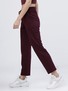 Deevaz Women Maroon Solid Port Royale Casual Straight Fit Track Pants In Maroon Color.