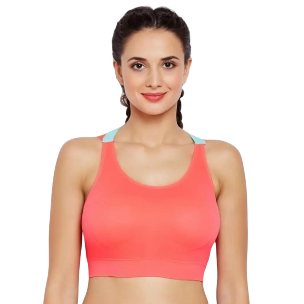 Deevaz Medium Impact Padded non-wired Sports Bra in Carrot Pink Colour with Neon Cross back strap detailing.