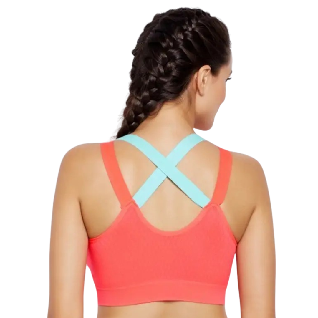 Deevaz Medium Impact Padded non-wired Sports Bra in Carrot Pink Colour with Neon Cross back strap detailing.