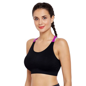 Deevaz Medium Impact Padded Non-Wired Sports Bra In Black Color With Lavender Cross Back Strap Detailing.
