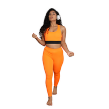 Load image into Gallery viewer, Deevaz Pair Of Comfort Fit Active Sports Bra &amp; Snug Fit Active Ankle-Length Tights In Orange Color.