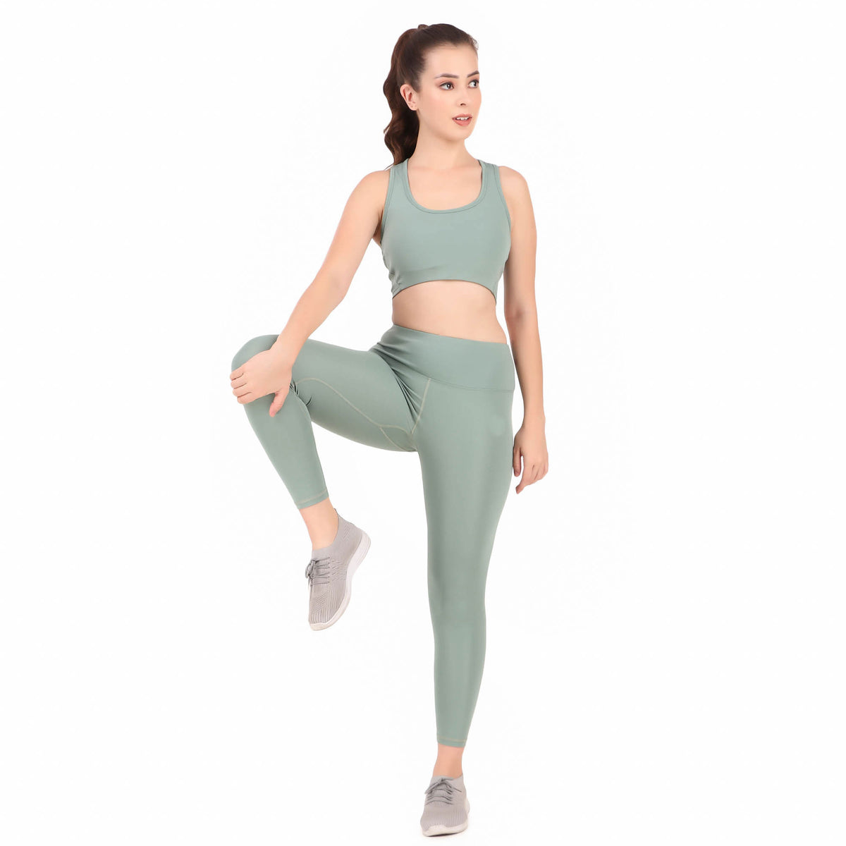 Deevaz Pair of Medium Impact Sports Bra & Tights in Sea Green Colour with Interlock details.