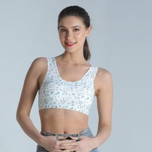 Load image into Gallery viewer, Deevaz Seamless Non-Wired Sports Bra With Removable Cups In Printed White Colour.