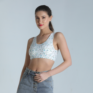 Deevaz Seamless Non-Wired Sports Bra With Removable Cups In Printed White Colour.