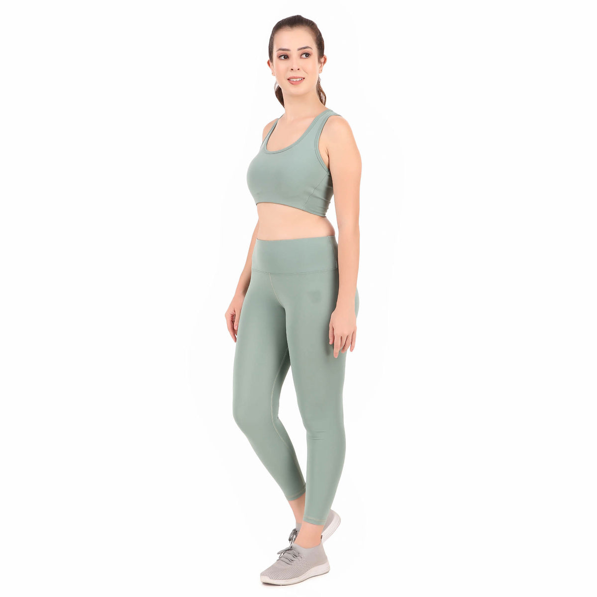 Deevaz Pair of Medium Impact Sports Bra & Tights in Sea Green Colour with Interlock details.